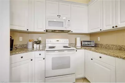 470 Launch Cir #V-405, Naples, FL 34108 - Photo 7