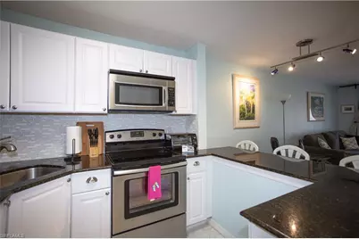 225 Turtle Lake Ct #106, Naples, FL 34105 - Photo 1