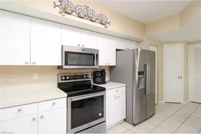 5025 Cedar Springs Dr #102, Naples, FL 34110 - Photo 25