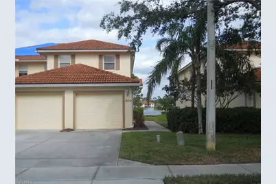 500 Robin Hood Cir #202, Naples, FL 34104 - Photo 1