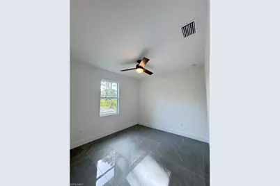 842 Giorgio Ave S, Lehigh Acres, FL 33974 - Photo 21