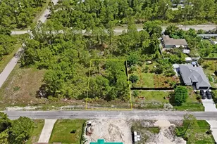 1065 Bells St E, Lehigh Acres, FL 33974 - Photo 1