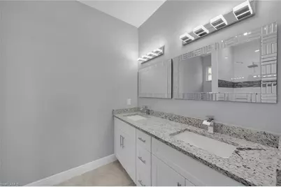 908 Barcia St E, Lehigh Acres, FL 33974 - Photo 23