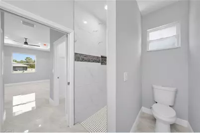 908 Barcia St E, Lehigh Acres, FL 33974 - Photo 25