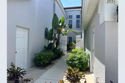 25240 Pelican Creek Cir #202, Bonita Springs, FL 34134 - Photo 3