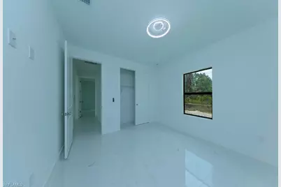 719 Almelia St E, Lehigh Acres, FL 33974 - Photo 49