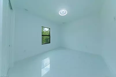 719 Almelia St E, Lehigh Acres, FL 33974 - Photo 47