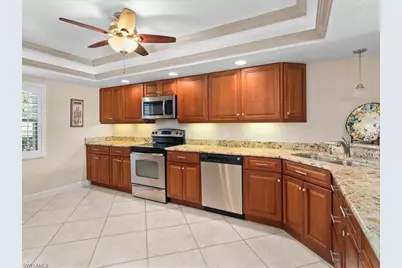 1520 Imperial Golf Course Blvd #211, Naples, FL 34110 - Photo 11