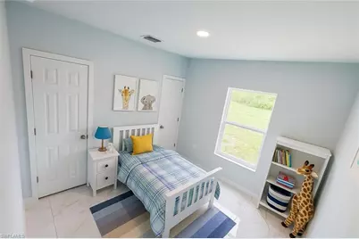842 Sentinela Blvd, Lehigh Acres, FL 33974 - Photo 19
