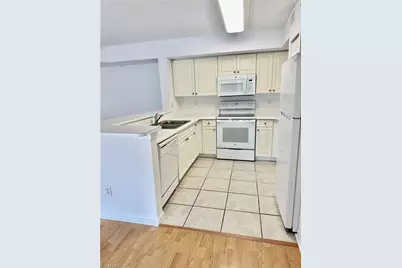 1260 Wildwood Lakes Blvd #204, Naples, FL 34104 - Photo 5