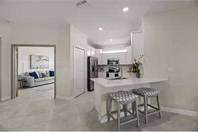 9051 Leatherwood Loop, Lehigh Acres, FL 33936 - Photo 11