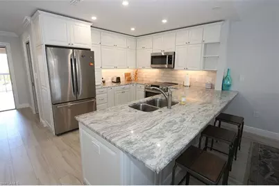 6131 Pelican Bay Blvd #I4, Naples, FL 34108 - Photo 13