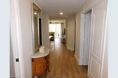 7655 Pebble Creek Cir #302, Naples, FL 34108 - Photo 19