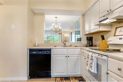 1075 Foxfire Ln #103, Naples, FL 34104 - Photo 9