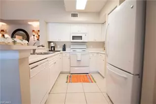 1220 Wildwood Lakes Blvd, Naples, FL 34104 - Photo 19