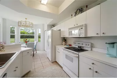 2875 Cypress Trace Cir, Naples, FL 34119 - Photo 19