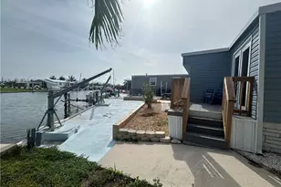 3913 Dewberry Ln, Saint James City, FL 33956 - Photo 1