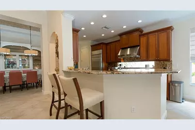 7667 Martino Cir, Naples, FL 34112 - Photo 13