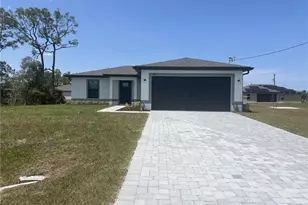 409 Broadmoor St, Lehigh Acres, FL 33974 - Photo 1