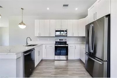 1909 Moore Ave, Lehigh Acres, FL 33972 - Photo 5