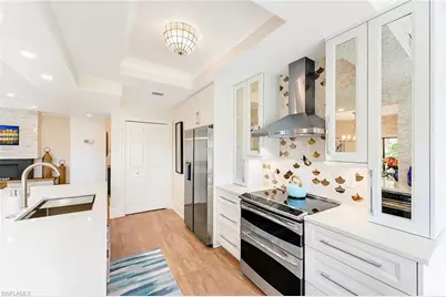 6770 Pelican Bay Blvd E #242, Naples, FL 34108 - Photo 7