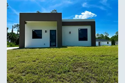 323 Mangonia Ave, Lehigh Acres, FL 33974 - Photo 1
