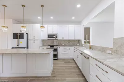 9217 Troon Lakes Dr, Naples, FL 34109 - Photo 1