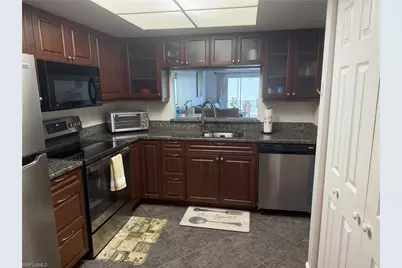 5535 Rattlesnake Hammock #104, Naples, FL 34113 - Photo 1