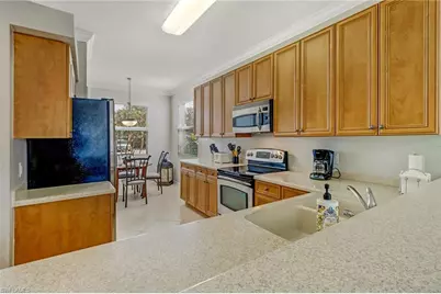 10275 Heritage Bay Blvd #711, Naples, FL 34120 - Photo 11