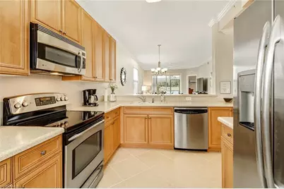 10275 Heritage Bay Blvd #711, Naples, FL 34120 - Photo 13