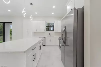 915 Anthony St E, Lehigh Acres, FL 33974 - Photo 35