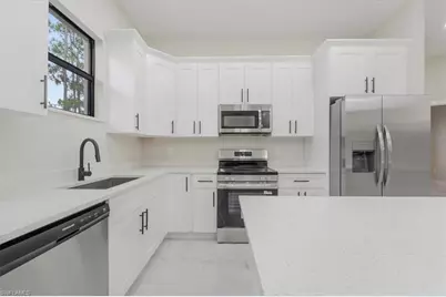 915 Anthony St E, Lehigh Acres, FL 33974 - Photo 33