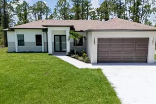 915 Anthony St E, Lehigh Acres, FL 33974 - Photo 1