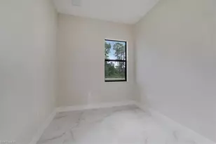 915 Anthony St E, Lehigh Acres, FL 33974 - Photo 25