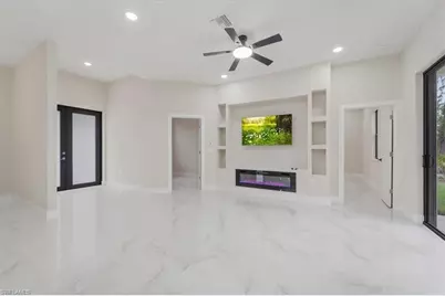 915 Anthony St E, Lehigh Acres, FL 33974 - Photo 3