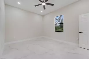 915 Anthony St E, Lehigh Acres, FL 33974 - Photo 15