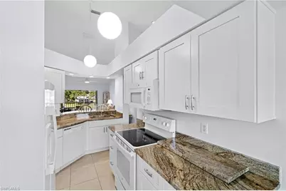 121 Wading Bird Cir #B201, Naples, FL 34110 - Photo 3