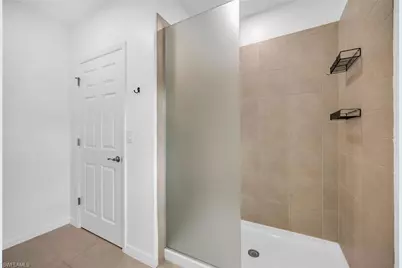 26974 Wildwood Pines Ln, Bonita Springs, FL 34135 - Photo 19