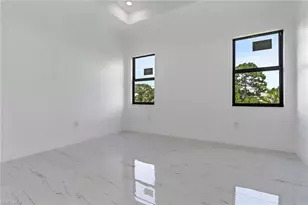 2911 28th St SW, Lehigh Acres, FL 33976 - Photo 7