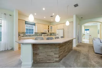 9067 Cherry Oaks Trl #202, Naples, FL 34114 - Photo 11