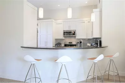 589 Beachwalk Cir #P-203, Naples, FL 34108 - Photo 9