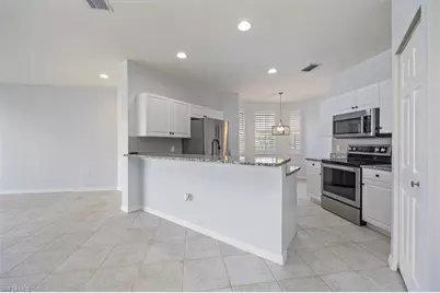 6235 Wilshire Pines Cir #1404, Naples, FL 34109 - Photo 7