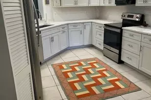 7048 Pelican Bay Blvd, Naples, FL 34108 - Photo 5