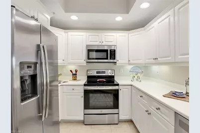 1001 Arbor Lake Dr #102, Naples, FL 34110 - Photo 11