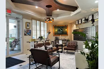 5660 Strand Ct #106, Naples, FL 34110 - Photo 1