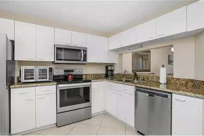 7754 Emerald Cir #T202, Naples, FL 34109 - Photo 11