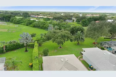 2329 Heritage Greens Dr, Naples, FL 34119 - Photo 19