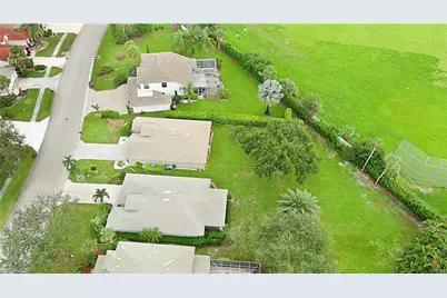 2329 Heritage Greens Dr, Naples, FL 34119 - Photo 23