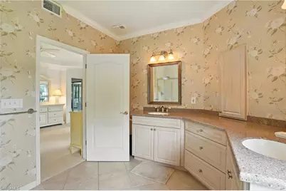 7032 Pelican Bay Blvd #E304, Naples, FL 34108 - Photo 23