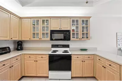 7032 Pelican Bay Blvd #E304, Naples, FL 34108 - Photo 17